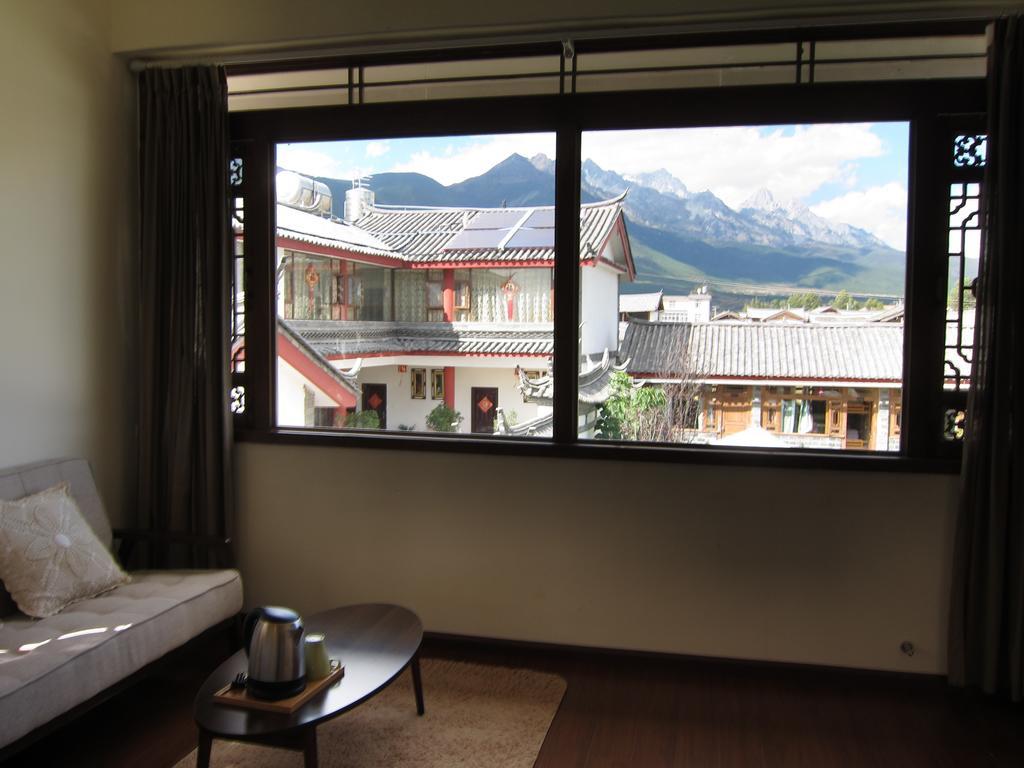 Lijiang Baisha There International Youth Hostel Room photo